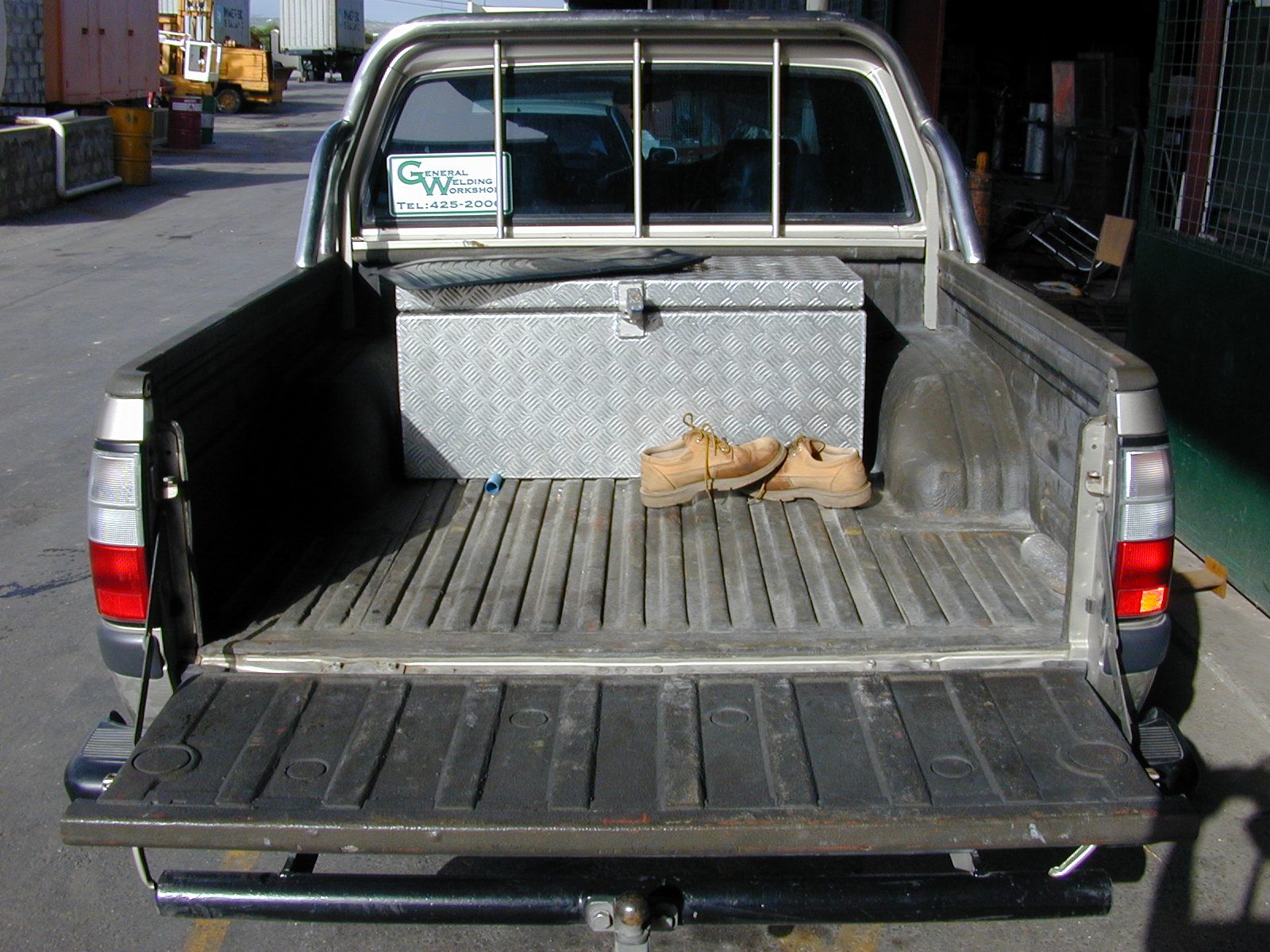 High-build polyurea coating in a pickup bed
